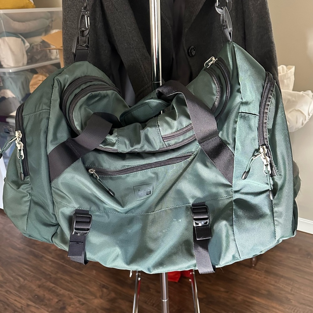 REI duffel bag/backpack, green, used in good condition